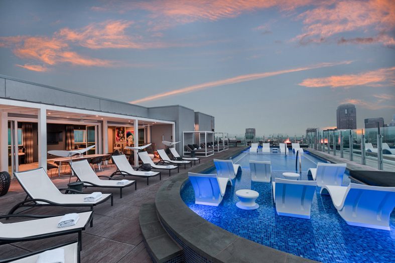 Humphreys Partners Architects One Uptown Rooftop Pool Dusk